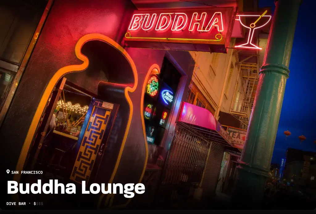 Exterior view of Buddha Lounge, a dive bar in San Francisco, featuring neon signs and vibrant lighting.